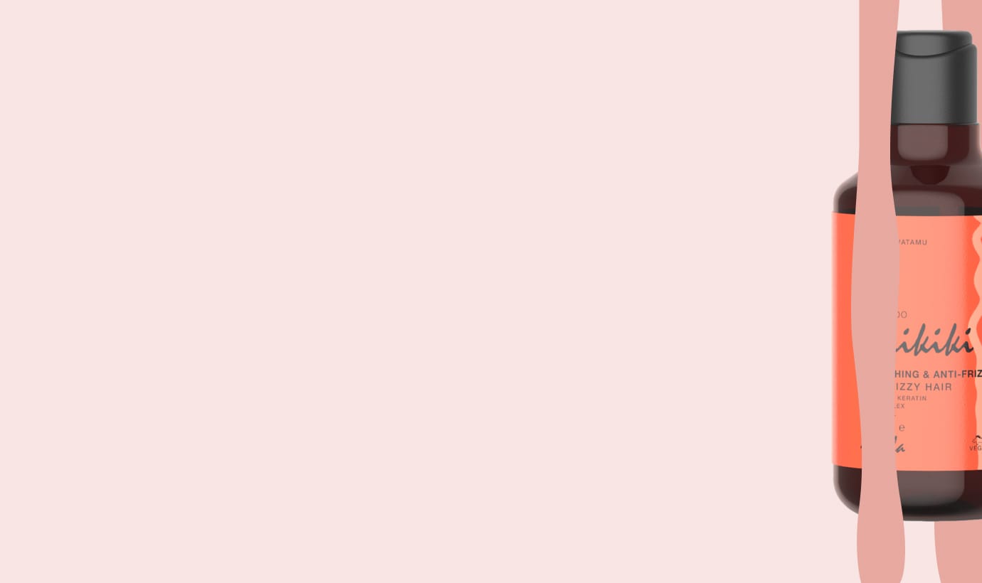 Flacone di prodotto Linea Waikiki per capelli crespi e disordinati, con etichetta arancione su sfondo rosa chiaro.